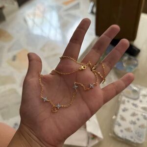 Elegant  Gold bracelet with Purple Accents